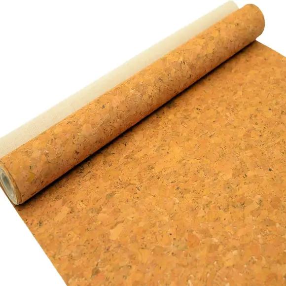 A roll of natural cork fabric partly unrolled on a white ground, its cotton backing showing at the edge