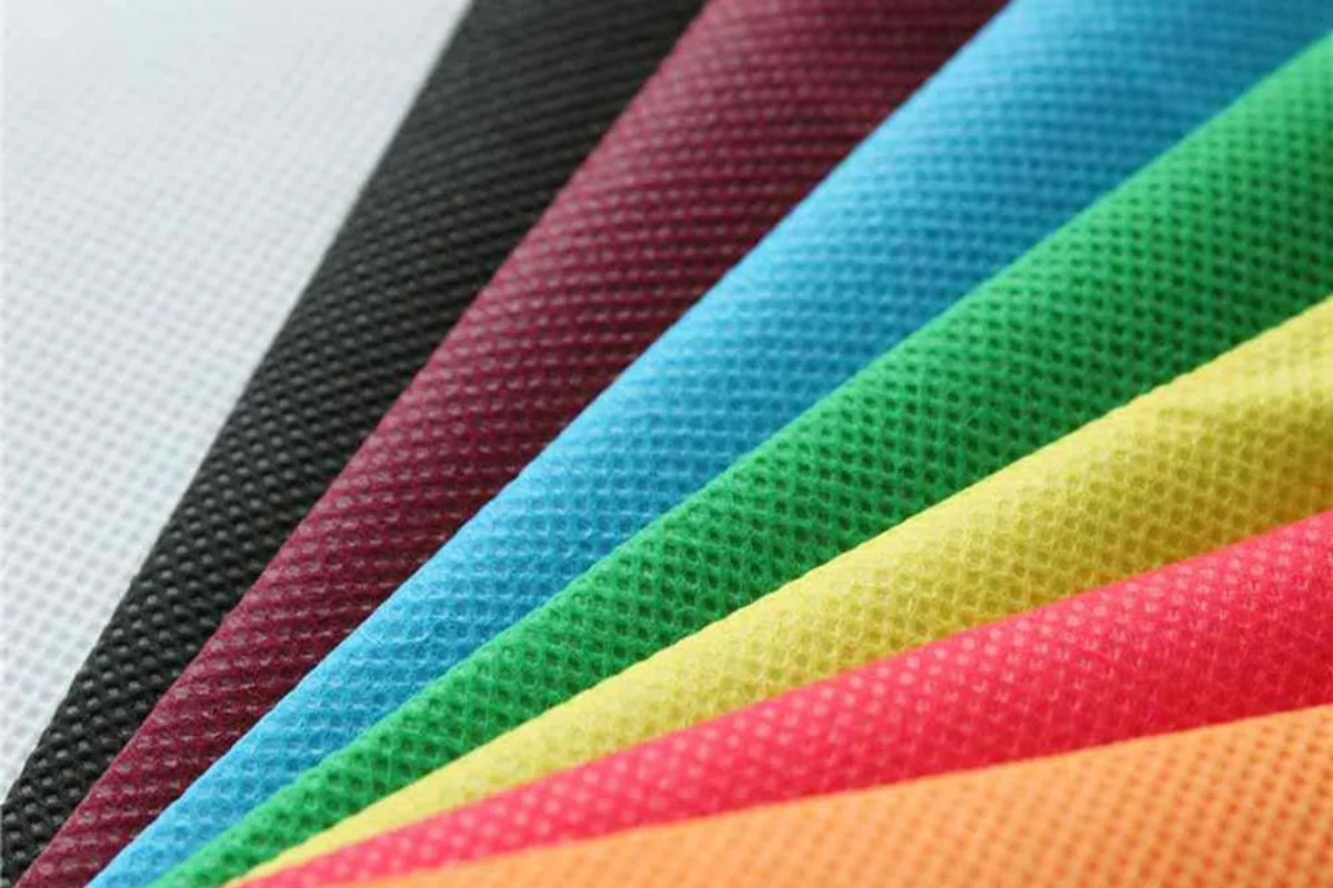 Fanned colour swatches of polypropylene non-woven fabric