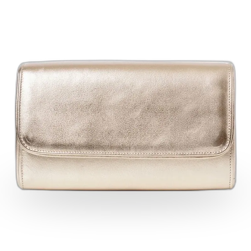 A gold-metallic clutch bag made as a custom sample