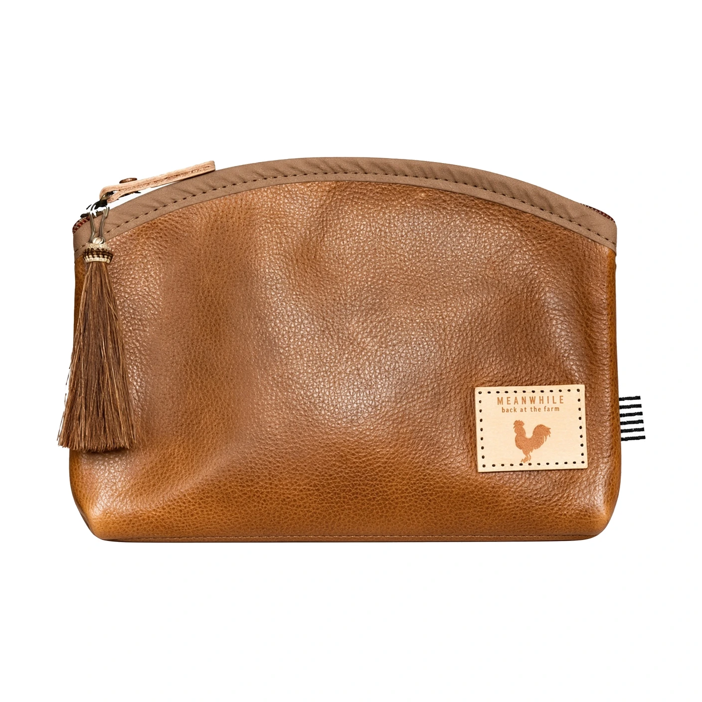 A tan leather zip-top clutch pouch with a tassel pull and a small stitched patch