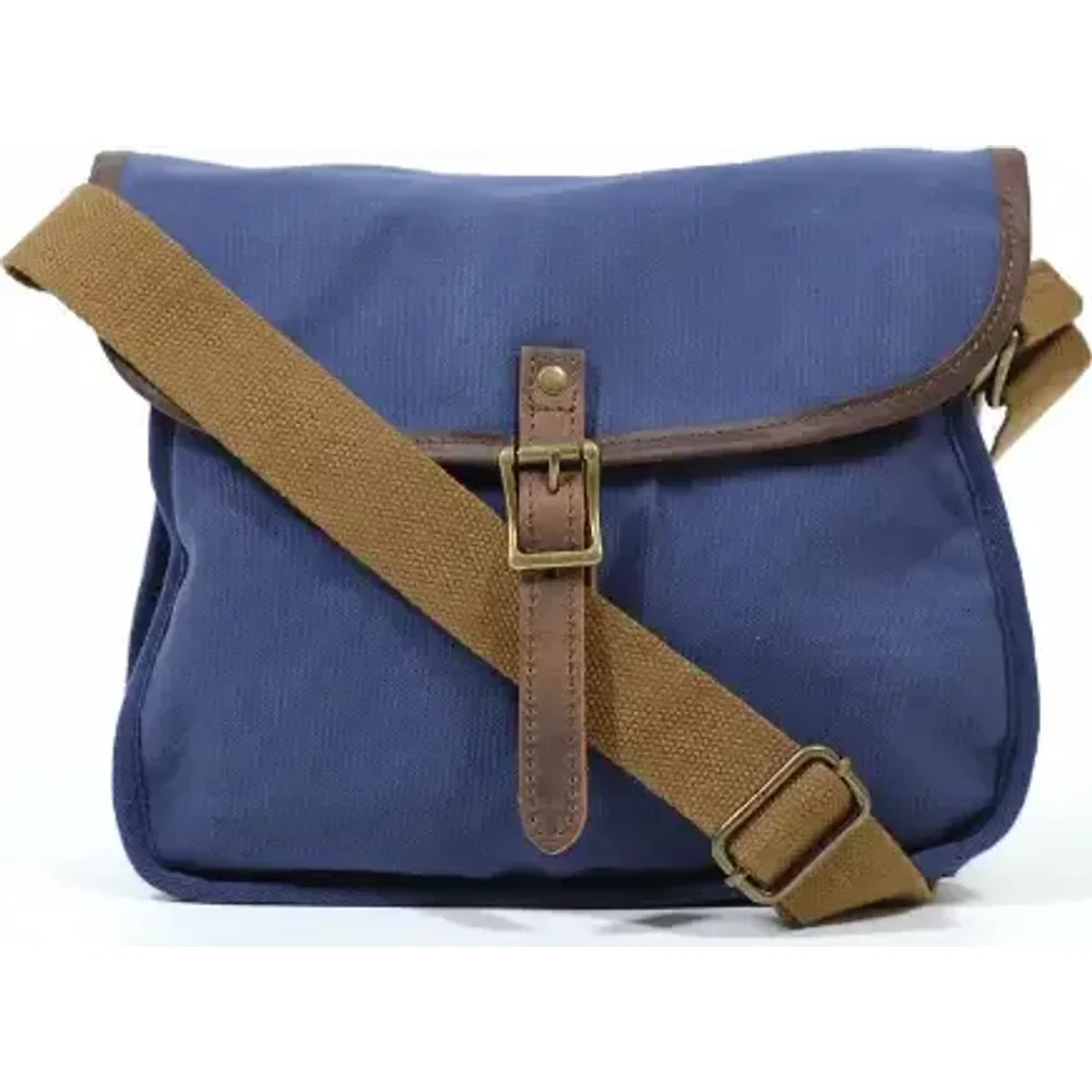 A blue canvas messenger bag with a front pouch pocket and a webbing strap finished with a metal buckle