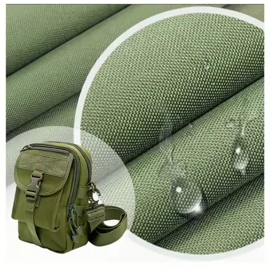 Water beading on olive-green coated nylon fabric beside a finished crossbody bag