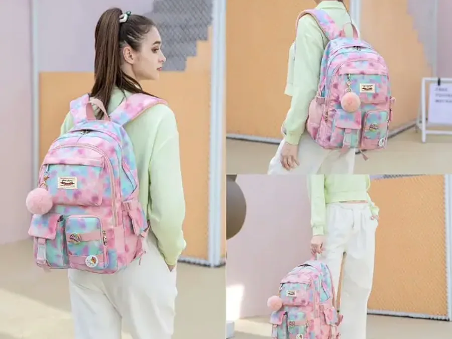 Two students walking through a bright corridor with pastel backpacks slung over one shoulder