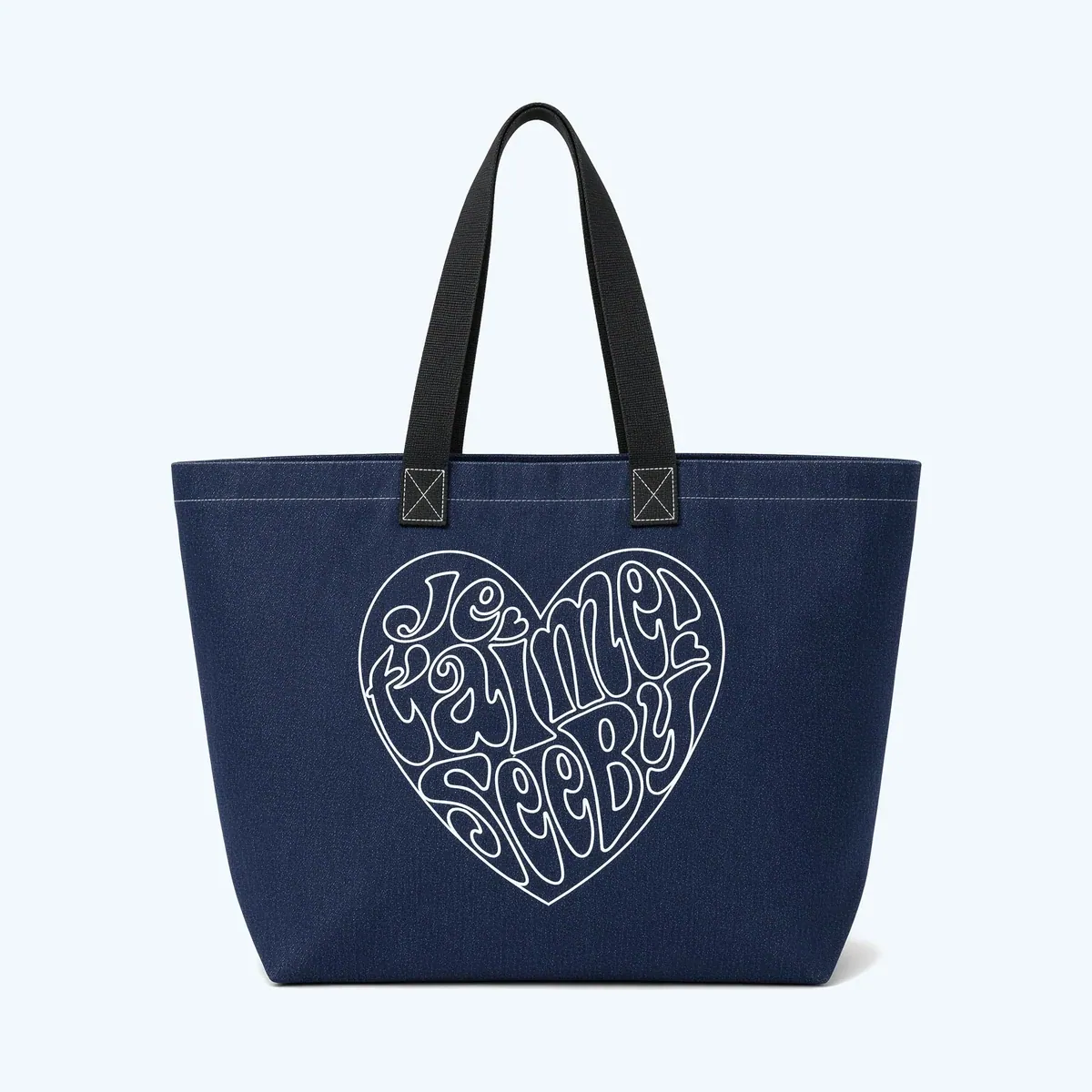 A navy recycled cotton tote bag with a printed heart motif and webbing handles