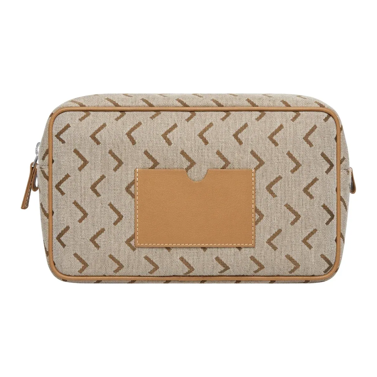 A custom travel toiletry pouch in a printed shell with a leather patch pocket